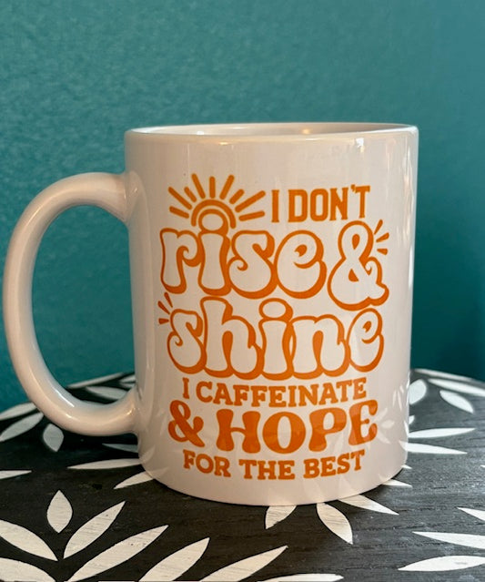 Mug - 11 oz - I Don't Rise and Shine . . . I Caffeinate and Hope For The Best